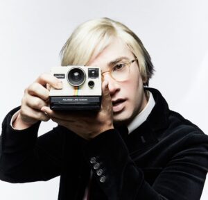 Ryan Raftery as Andy Warhol